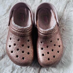 CROC’s size J1 lined clogs, glitter gold, gently used